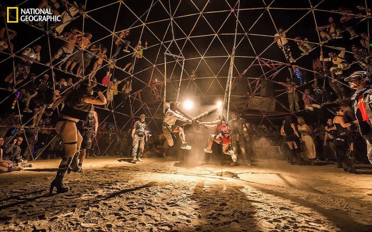 one-entry-from-national-geographics-2014-photo-contest-shows-burning-mans-thunderdome-run-by-a-group-called-the-death-guild-in-the-thunderdome-combatants-use-foam-bats-to-assault-each-other-