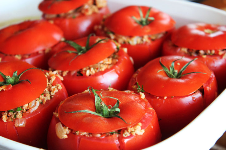 Stuffed Tomatoes in a White Baking Dish 1 of 2