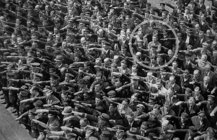 a-lone-man-refusing-to-do-the-nazi-salute-1936